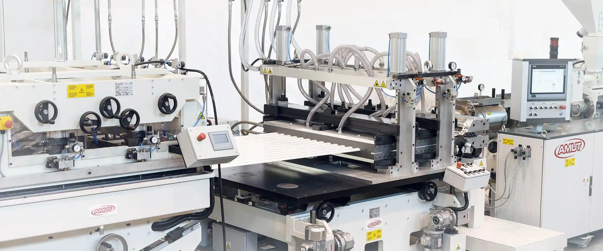 Lines for the production of corrugated panels
